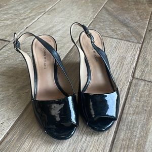 Antonio Melani black leather wedge shoes. Size 7.